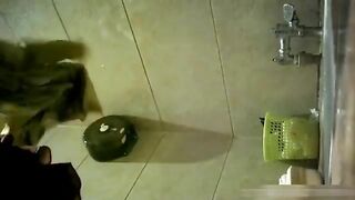 Chinese girl pissing in toilet